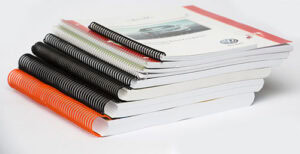 Exemples de reliure spirale pour documents faits en photocopie couleur et noir et blanc.